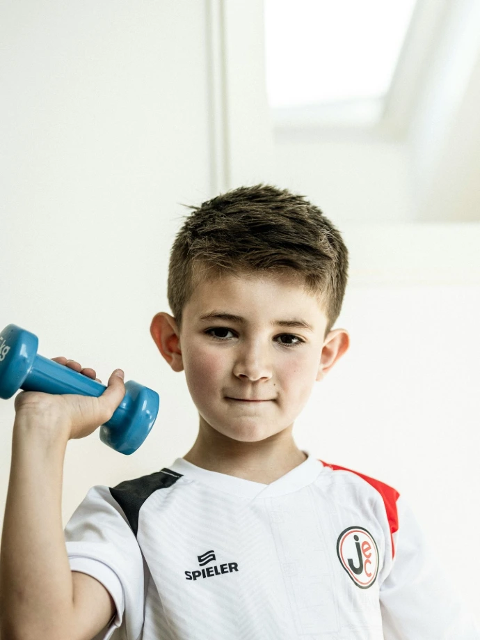 Child doing athletic training at OGteebox
