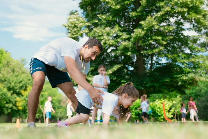 Coach and child at OGteebox youth golf program